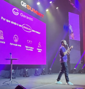 Garantti apresenta soluções durante o QR Summit 2025
