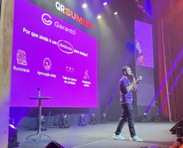 Garantti apresenta soluções durante o QR Summit 2025